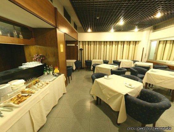 Hotel Giotto Turim Restaurante foto